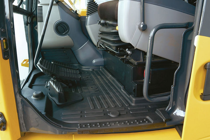 Rounded cab design with sliding door