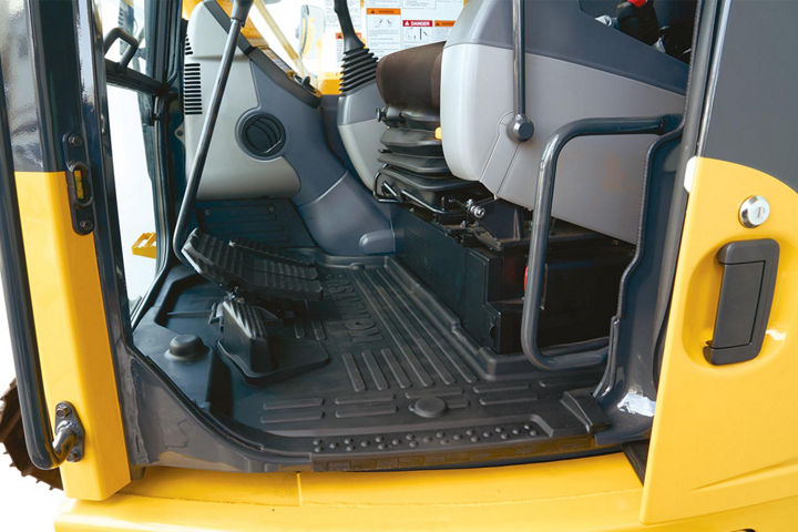 Rounded cab design with sliding door