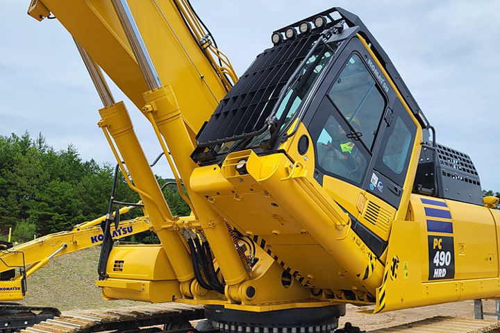 Tilting demolition cab