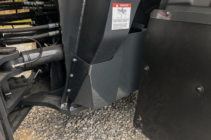 Boom cylinder hose guards