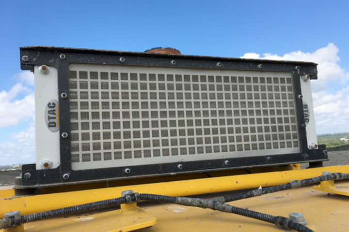 Re-located A/C condenser