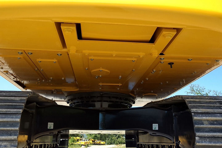 Severe duty revolving frame under covers